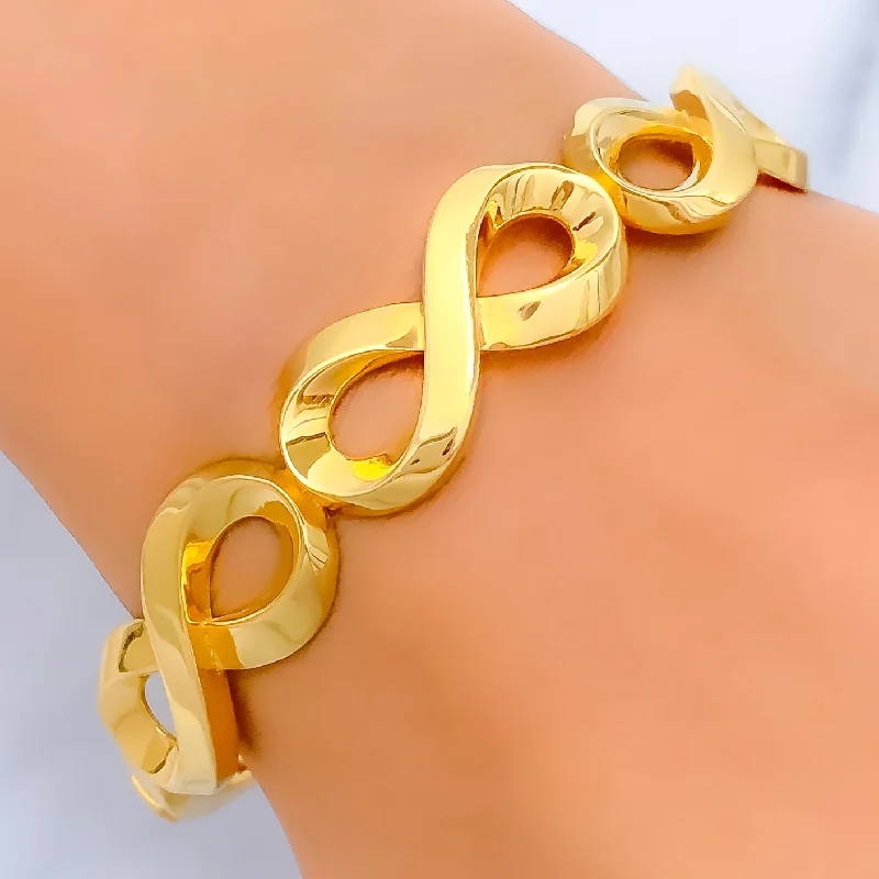 Elegant charm bracelets for women -Ornate Infinity Loop 22k Gold Bangle Bracelet